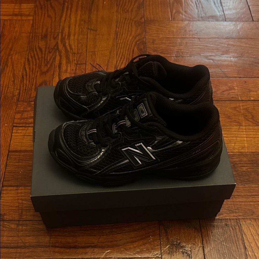 New Balance Kids Black Athletic Sneakers with Silver Logo